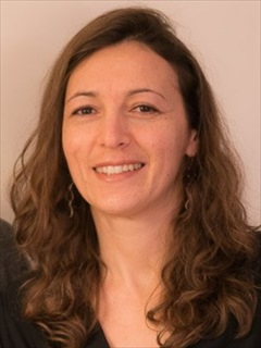 Headshot of Lydia Ilieva, P.T., COMT, CMTPT, Center Manager